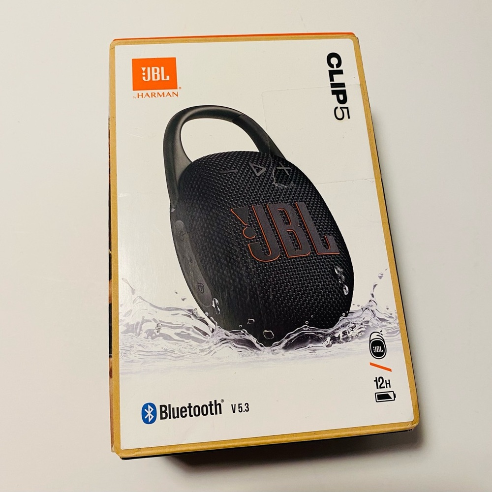JBL Clip 5 Portable Bluetooth Speaker - Black with Orange Logo